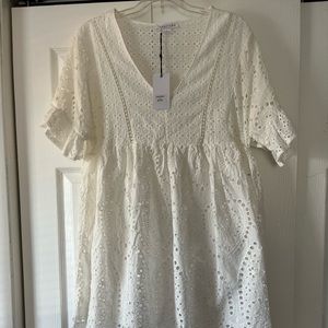 Boutique purchased white eyelet midi dress with liner. Size L.